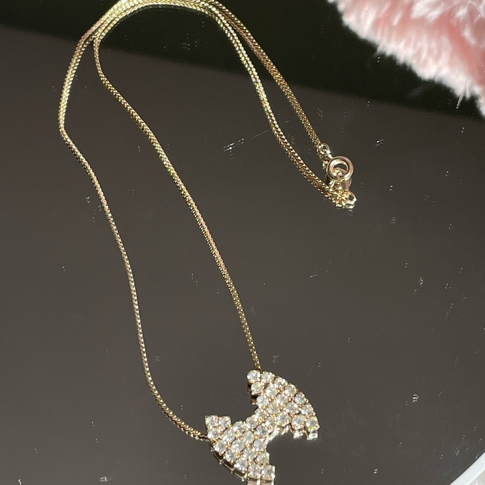 Gold Tone Necklace with Rhinestone Bow Pendant